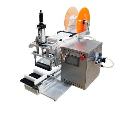 China Semi  Automatic Manual Disinfect Gel Flat Square Bottle Container Paper Roll Labels Labeling Machine for sale
