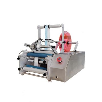 China Semi Automatic Plastic Round Bottles Glass Vials Sticky Type Self-Adhesive Label Labeling Machine for sale