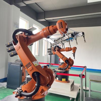China Kuka KR 16 Ten Axis Welding Robot On Track And H Shape Positioner Arc Welding , Loading And Unloading Of Parts  Handling en venta