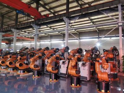 China Propiedad preestablecida de 210 kg de carga útil brazo robótico AC380V fuente de alimentación Kr210 modelo de perforación 3D láser visión láser de corte de fibra de vidrio en venta