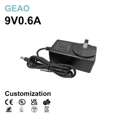 China 9V 0.6A Wall Mount Power Adapters For Amazon Hair Trimmer Car Cigarette Lighter Router Digital Photo Frame for sale