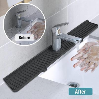 China FDA Reusable Silicone Kitchen Product Sink Water Splash Guard for sale