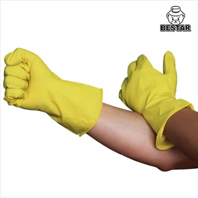 中国 ODMの黄色い世帯の乳液の手袋は台所のための並べられたゴム製手袋を群がらせる 販売のため