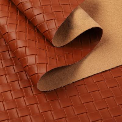 China Bolso de mano PVC Falso Tejido de cuero sintético con patrón tejido en relieve en venta
