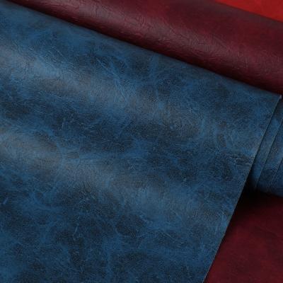 China Yangbuck Style Packaging Leather Non Woven PVC Imitation Leather Material for sale