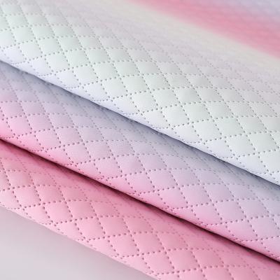 China Embossed Handbag PU Leather Fabric Texture Of Gradient Rainbow Diamond Grid for sale