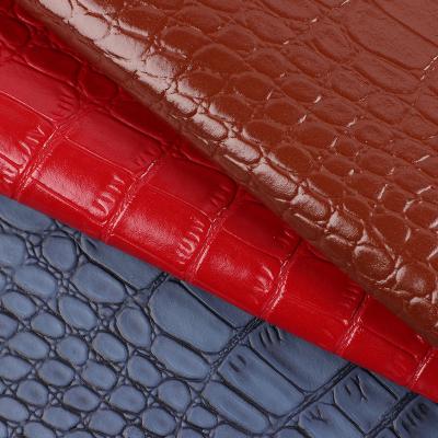 China Cuero en relieve de microfibra para zapatos de 1,2 mm Elegancia Cuero de patrón de cocodrilo en venta