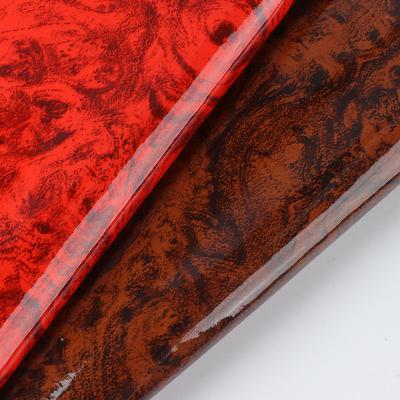 China 0.7mm Artificial Laser Engrave PU Leather Wood Grain Soft Peach for sale