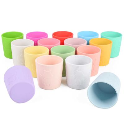 China Squirrel Embossment Silicone Training Cup For Infants Customized Color for sale