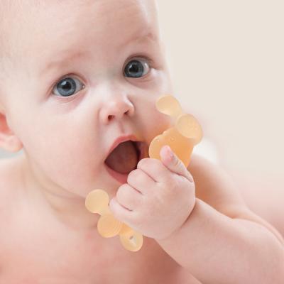 China Dentes de silicone para bebê brinquedo de grau alimentar para aliviar a dor de gengiva suave e durável à venda