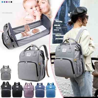 China Full Waterproof Printing School Bag Backpack Popular Folding Multifunctional Mother And Baby Bag With Net Mother Bag Backpack 8712 for sale