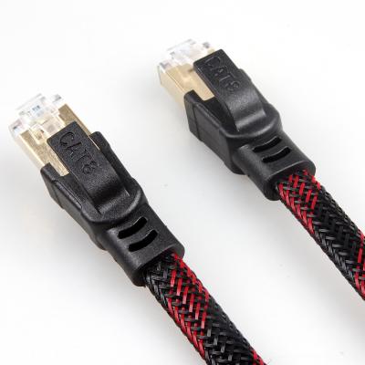 中国 Cat8安定したナイロン編みこみのイーサネット ケーブルの赤く黒い反干渉 販売のため