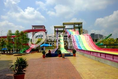 China Multi Lanes Rainbow FRP Custom Water Slides Amusement Park Big Fiberglass Water Slide for sale