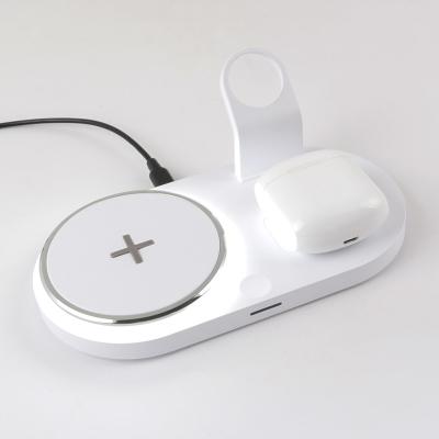 China Plástico branco 4 em 1 carregador sem fio para telefone fone de ouvido relógio carregamento rápido à venda