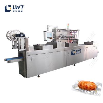 China Linha de produção de sacos de salsicha Máquina de embalagem a vácuo de filme de alongamento automático à venda