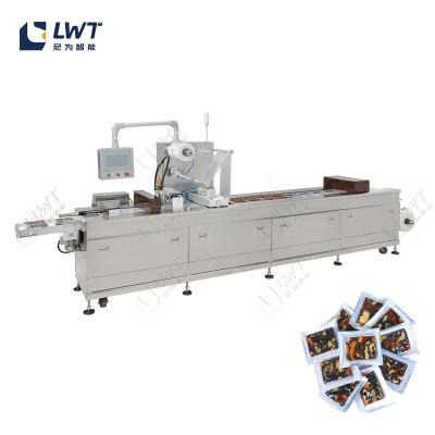China Donkey Hide Gelatin Vacuum Packaging Production Line Thermoforming Vacuum Packaging Machine for sale