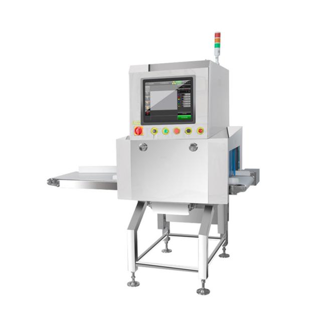 Close-up view of industrial metal detector machine components