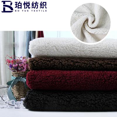 中国 Wholesale super soft polyester sherpa fleece fabric by manufacturer textile 販売のため