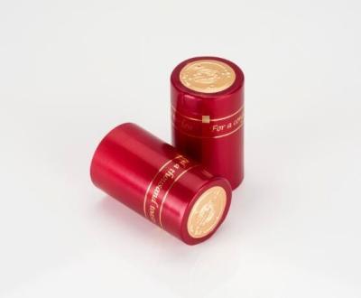 China Cápsulas retráctiles de PVC rojo ULTRAVIOLETA anti impermeables Casquillos retráctiles de vino de impresión de huecograbado en venta