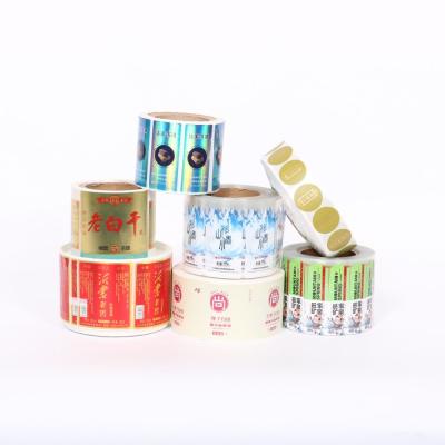 China Custom round adhesive waterproof synthetic paper bottle label sticker roll logo label sticker printing for sale