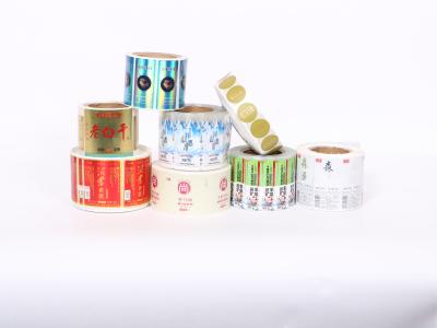 China Fabricantes Nombre de marca personalizado Impresión de logotipos Etiquetas adhesivas Etiquetas de rollo Adhesivos para embalajes en venta