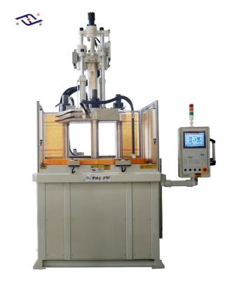 中国 85 Ton Plastic Wheels Vertical Injection Molding Machine With Rotary Table 販売のため
