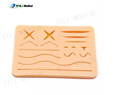 China Three Layers Skin Structure Silicone Suture Pad Practice Kits Medical Suturing Pad Kit for sale