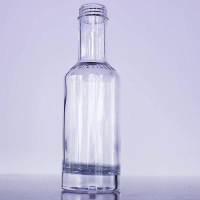 China 200ml Nordic Liquor Bottle With Shoulder Embossed Logo GPI 28x400 Screw Closures for sale