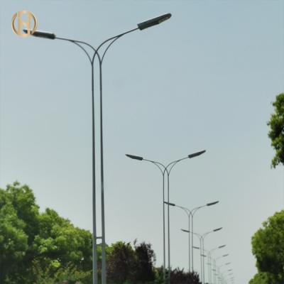 China 6 7 8 9m Solar Street Light Pole Two Arm Outdoor Street Lighting Pole for sale