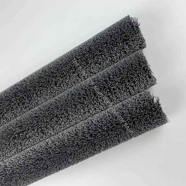 Bristle show of abrasive filament roller brush