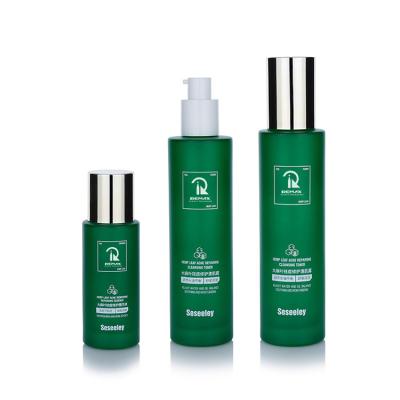 China Embalaje cosmético 50g 50ml 100ml Botella verde Botella de vidrio de la bomba para el cuidado de la piel en venta