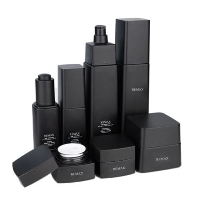 China Embalagem de vidro de luxo frasco de cosméticos Skincare Set Matt preto 30ml 100ml 125ml 50g à venda