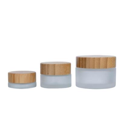 China 50g 61.3mm Cosmetic Bamboo Bottle Cosmetic Glass Jar Sustainable Packaging for sale