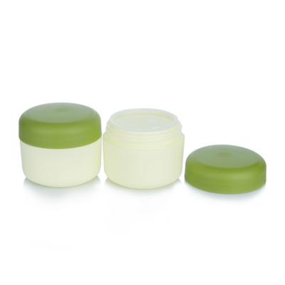 China Eco Friendly 35ml Empty Cream Jar Light Green Plastic Frosted Glass Cosmetic Jars for sale