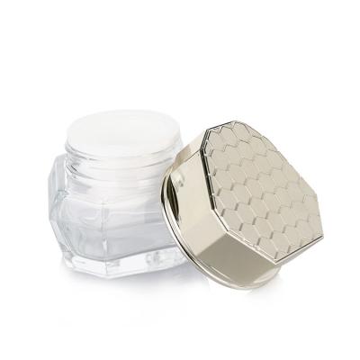 China Botella de vidrio transparente de 35 g Contenedores cosméticos vacíos con tapa de panal de miel de oro en venta