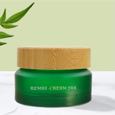 China 50ml Empty Face Cream Jar Green Matte Glass For Face Skin Care for sale