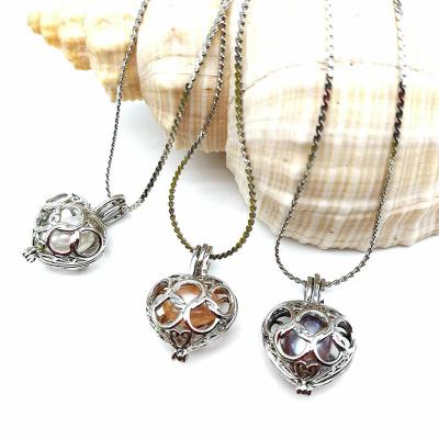 China Fashion Wish Pearl Pendant Necklace Natural Oyster Gift Love Heart Cage Holder Chokers Necklace For Women Jewelry for sale