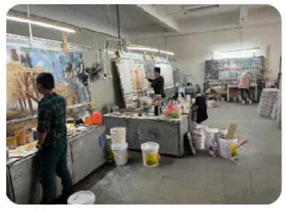 Professional artist creating oil painting
