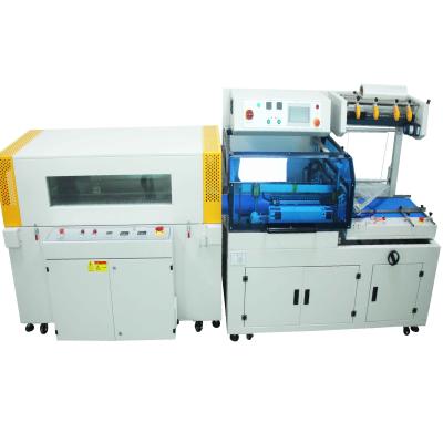China Manufacture Good Quality Automatic Heat Shrinking Wrapping Filling Box Carton Packaging Machine for sale