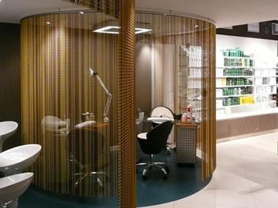 Chain link curtain used as space divider in modern interior