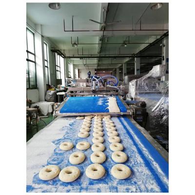 China 6000 Donuts Per Hour Capacity High-Speed Donut Fabrication Machine for Food Industry for sale