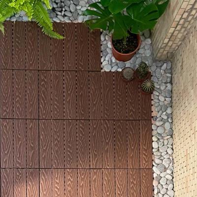 China Custom WPC Interlocking Decking Tiles Snap Together Outdoor Decking Tile for sale