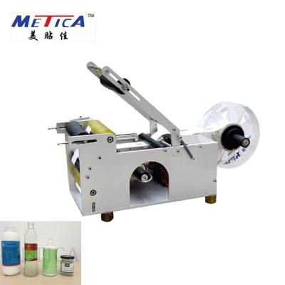 China 100w Manual Round Bottle Labeling Machine With 1mm Labeling Accuracy for sale