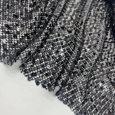 中国 Classic black sequin mesh embroidery fabric 190GSM breathable for party dresses 販売のため