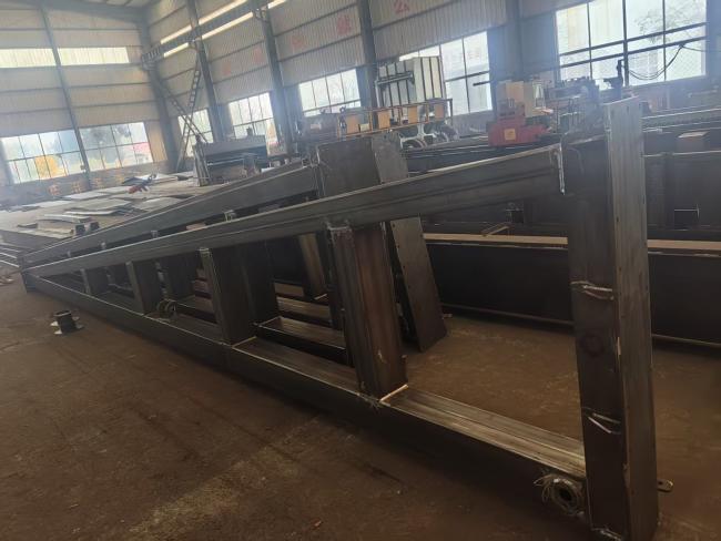 Close-up view of gantry crane hoist and control system