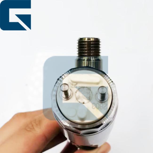 Close-up view of injector nozzle and fuel connection points