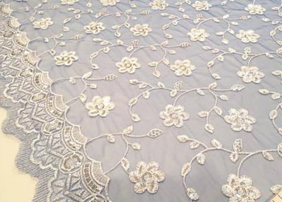China Embroidered White And Blue Sequin Floral Lace Fabric With Scalloped Edging for sale