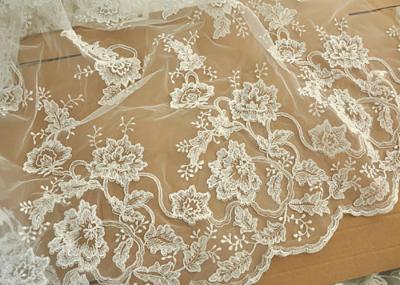 China Off White Wedding Dress Tulle Lace Fabric , Embroidery Beaded Ivory Bridal Lace Fabric for sale