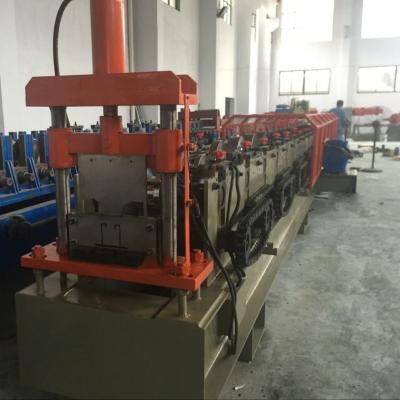 China 1.5mm Galvanized Ceiling Rail Shutter Door Roll Forming Machine With 11KW for sale