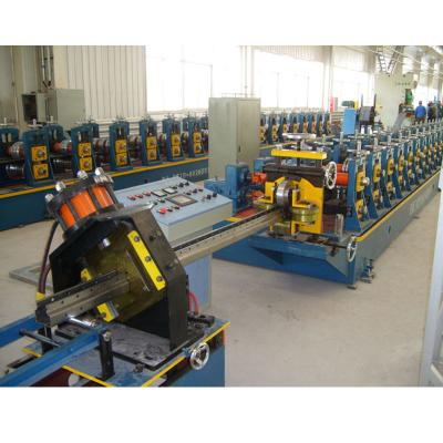 China 2.5mm Upright Rack Roll Forming Machine With 6 Meters Auto Stacker for sale
